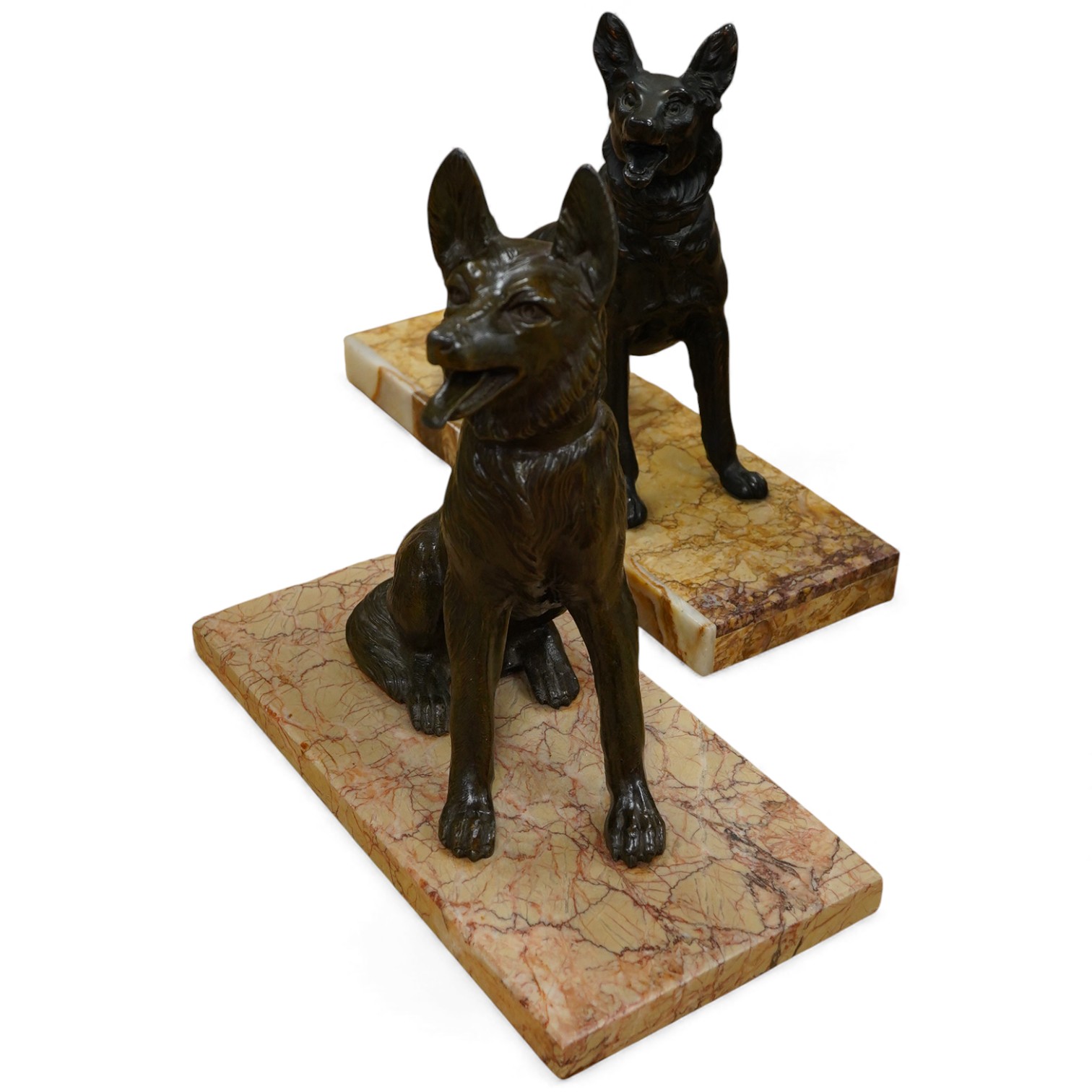 Two Art Deco style bronzed spelter Alsatians, largest 35cm wide